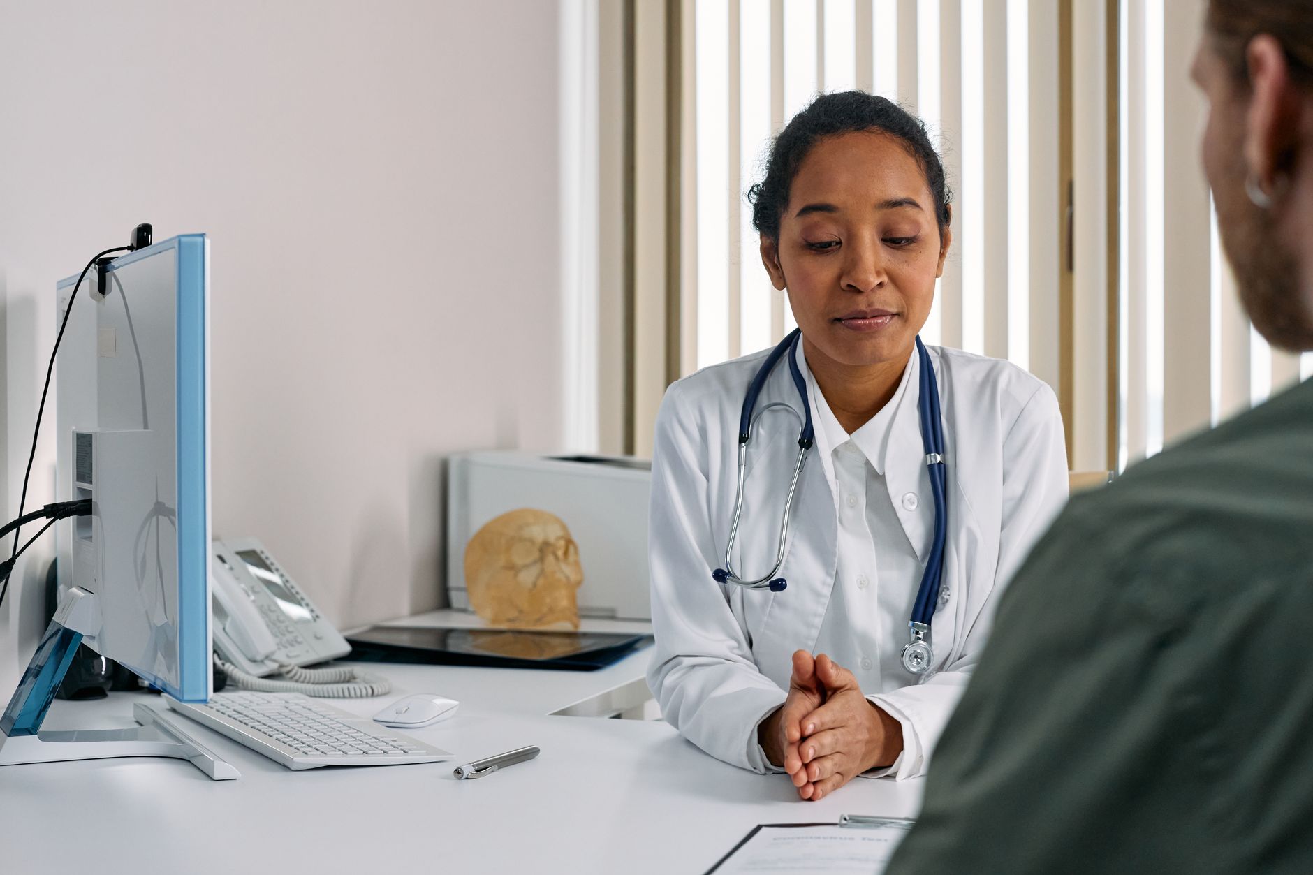 Psychiatric provider discussing a medication tapering plan with a patient in California